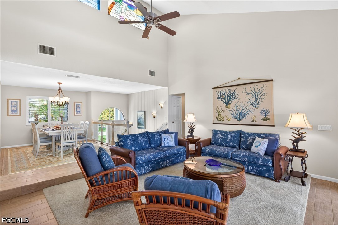 1057 Sand Castle Road Sanibel, FL 33957 - Photo 14 of 50 a living room with furniture a rug and a window