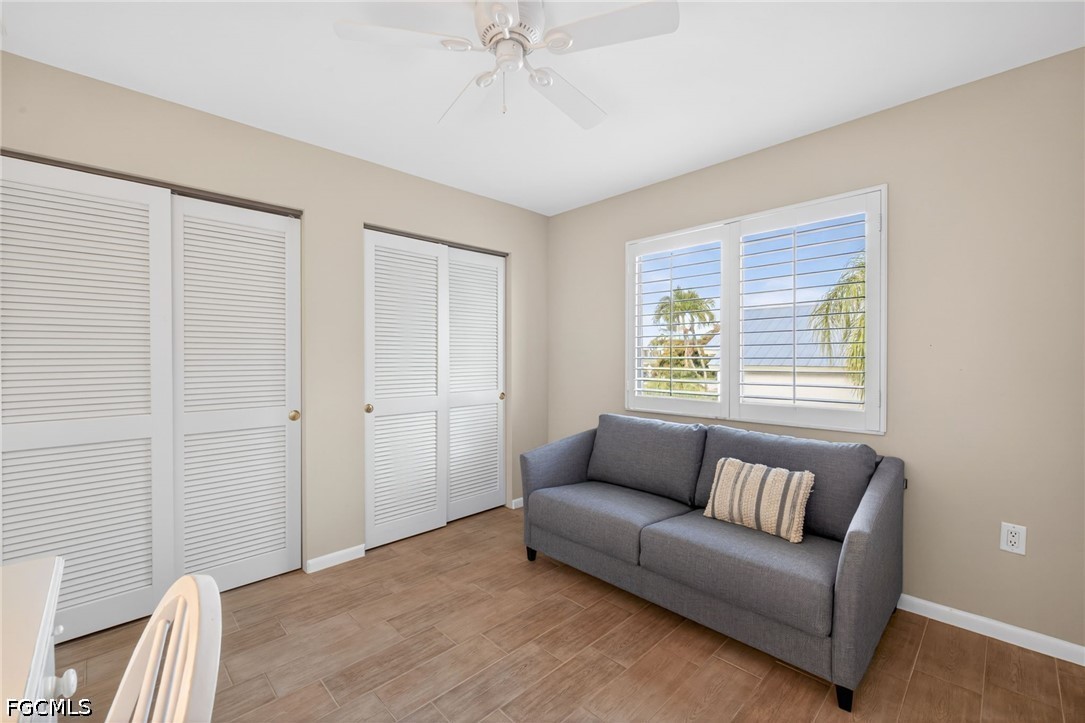 1057 Sand Castle Road Sanibel, FL 33957 - Photo 34 of 50 a living room with furniture and a window