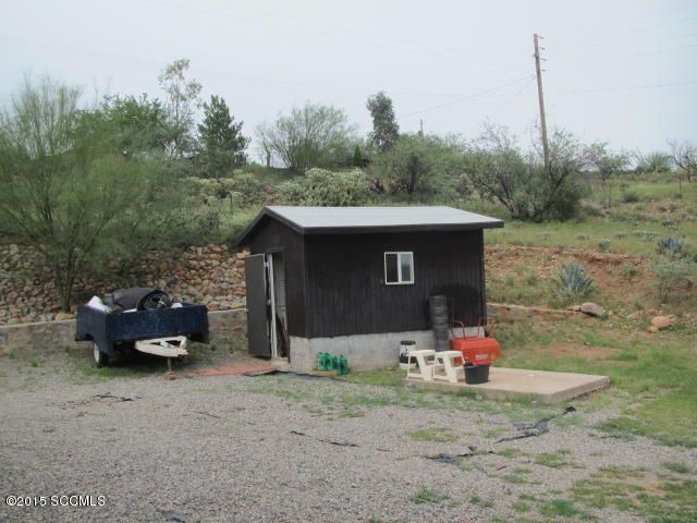 1171 Circulo Golfo Rio Rico, AZ 85648 - Photo 13 of 17 a backyard of a house with table and chairs