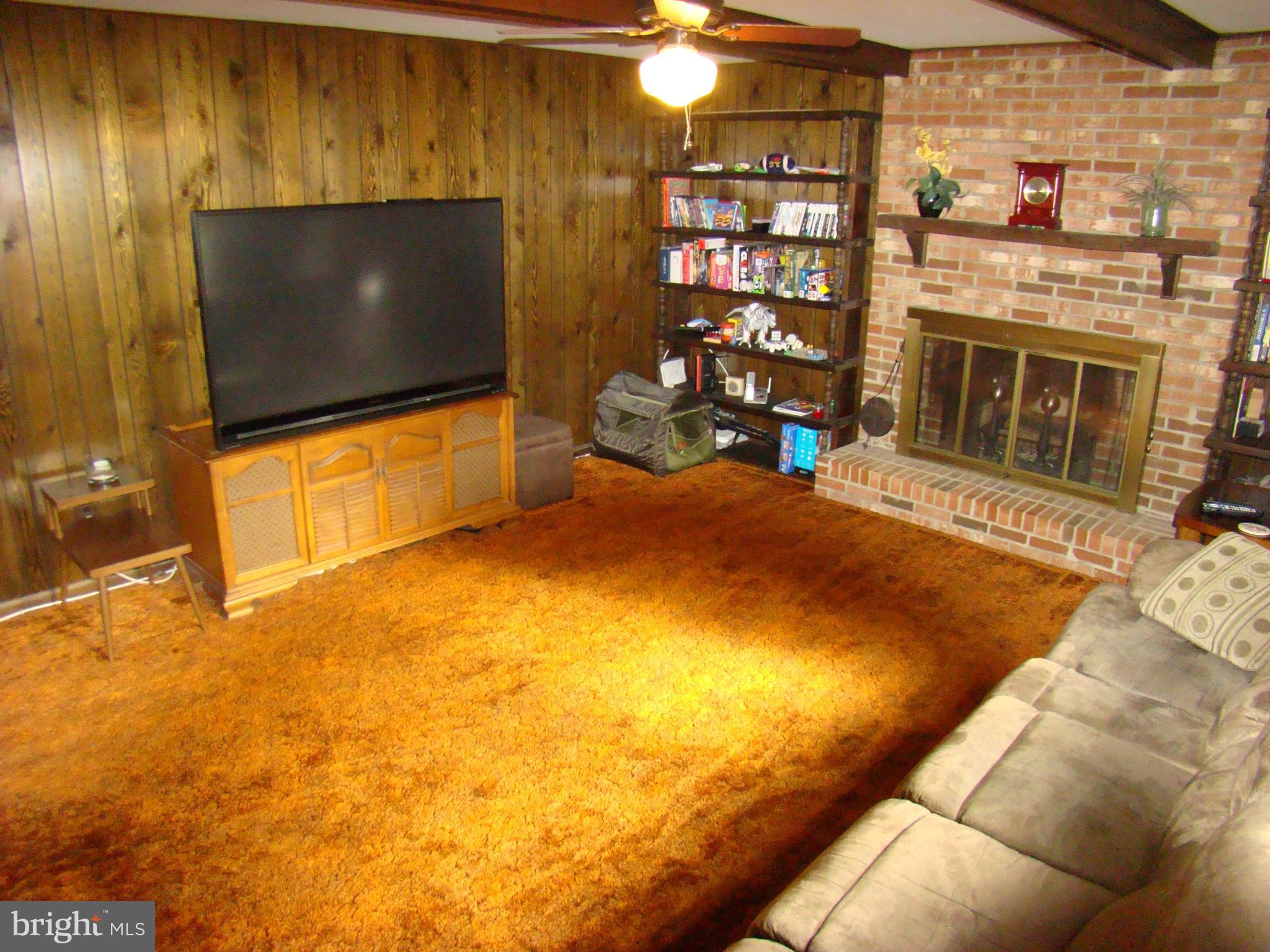 509 Clarks Run Road La Plata, MD 20646 - Photo 26 of 30 Family Room w brick fireplace off Kitchen