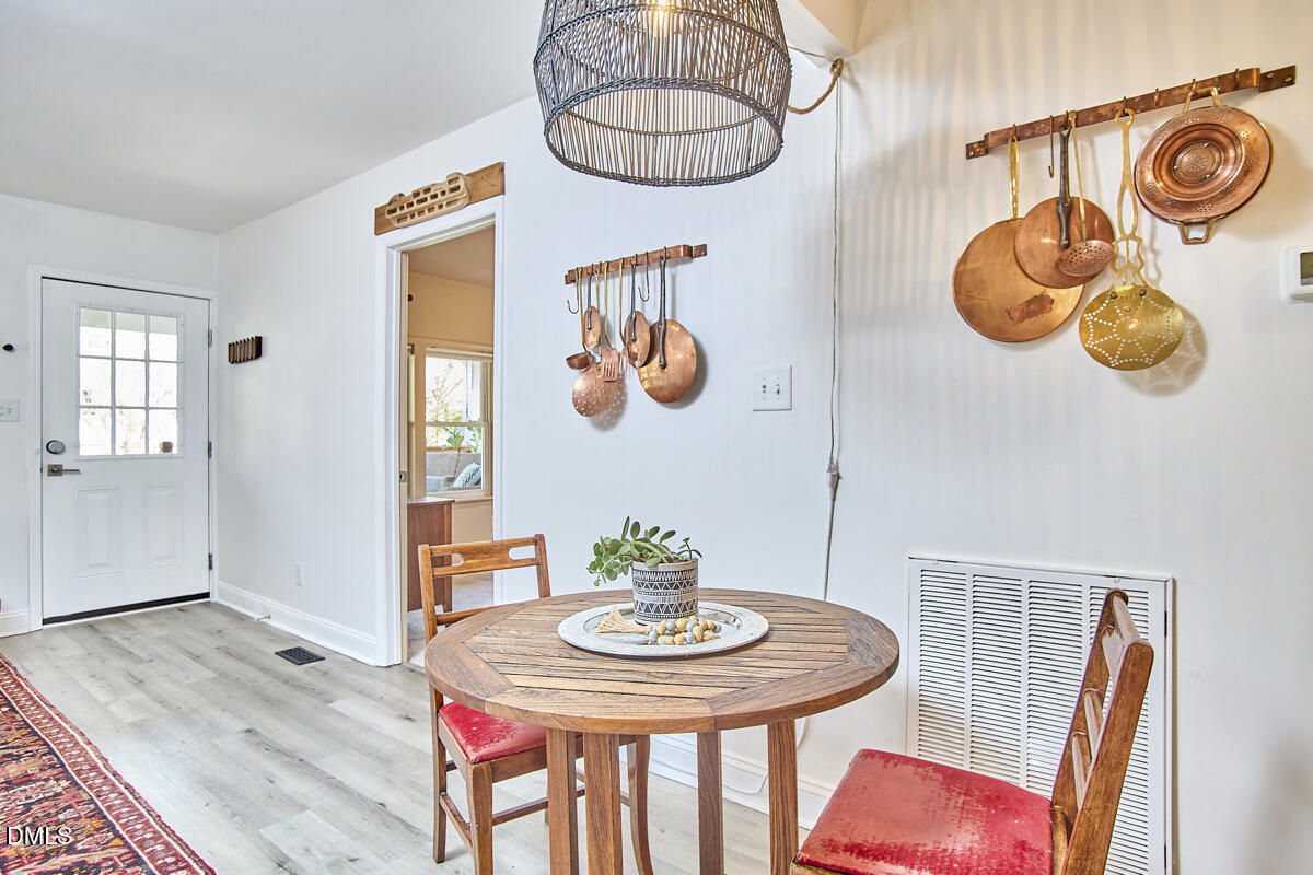 214 Moline Street Durham, NC 27707 - Photo 23 of 49 a view of a dining room with furniture
