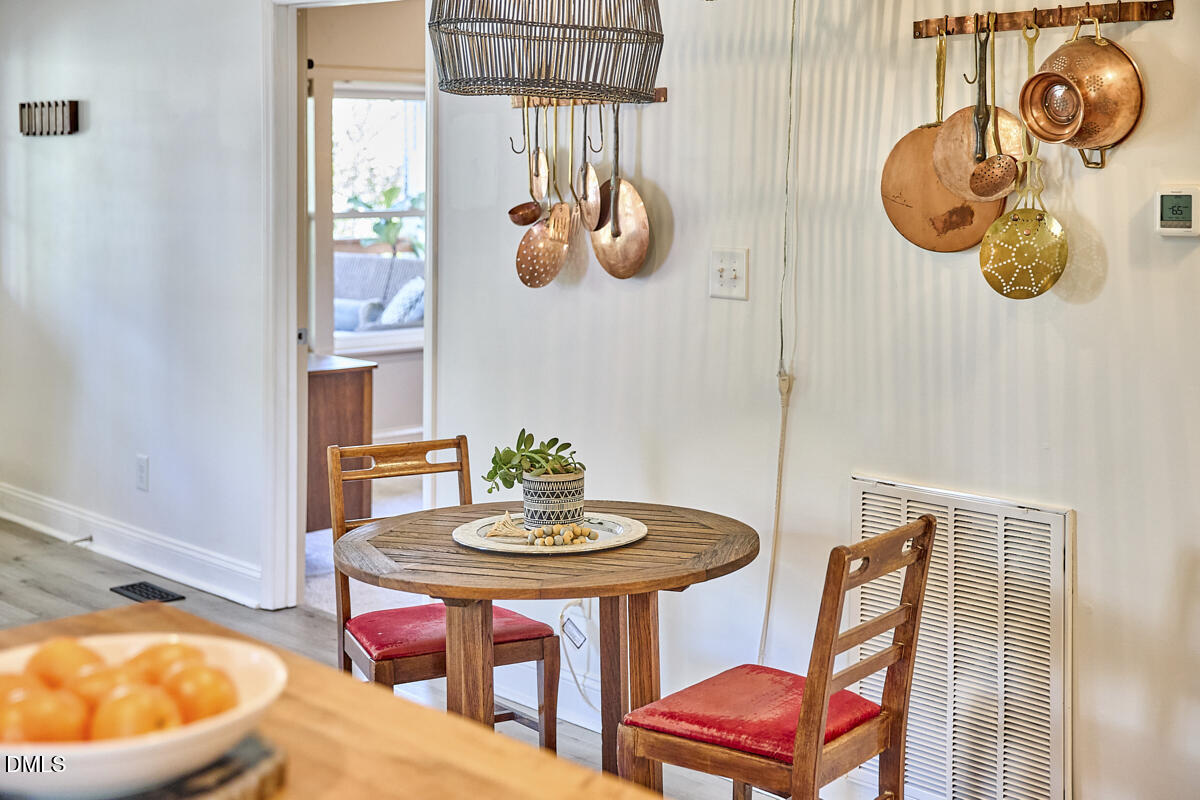 214 Moline Street Durham, NC 27707 - Photo 25 of 49 a dining room with furniture and window