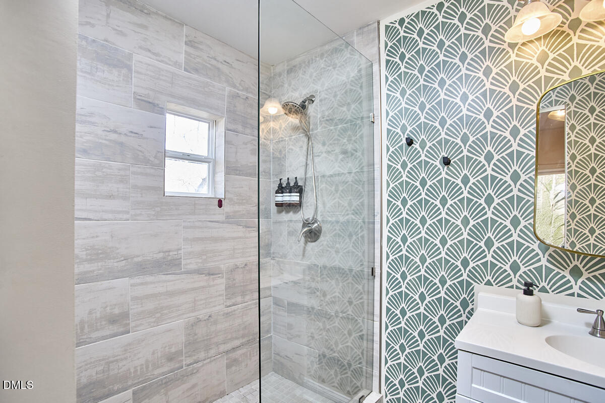 214 Moline Street Durham, NC 27707 - Photo 30 of 49 a bathroom with a shower and a sink