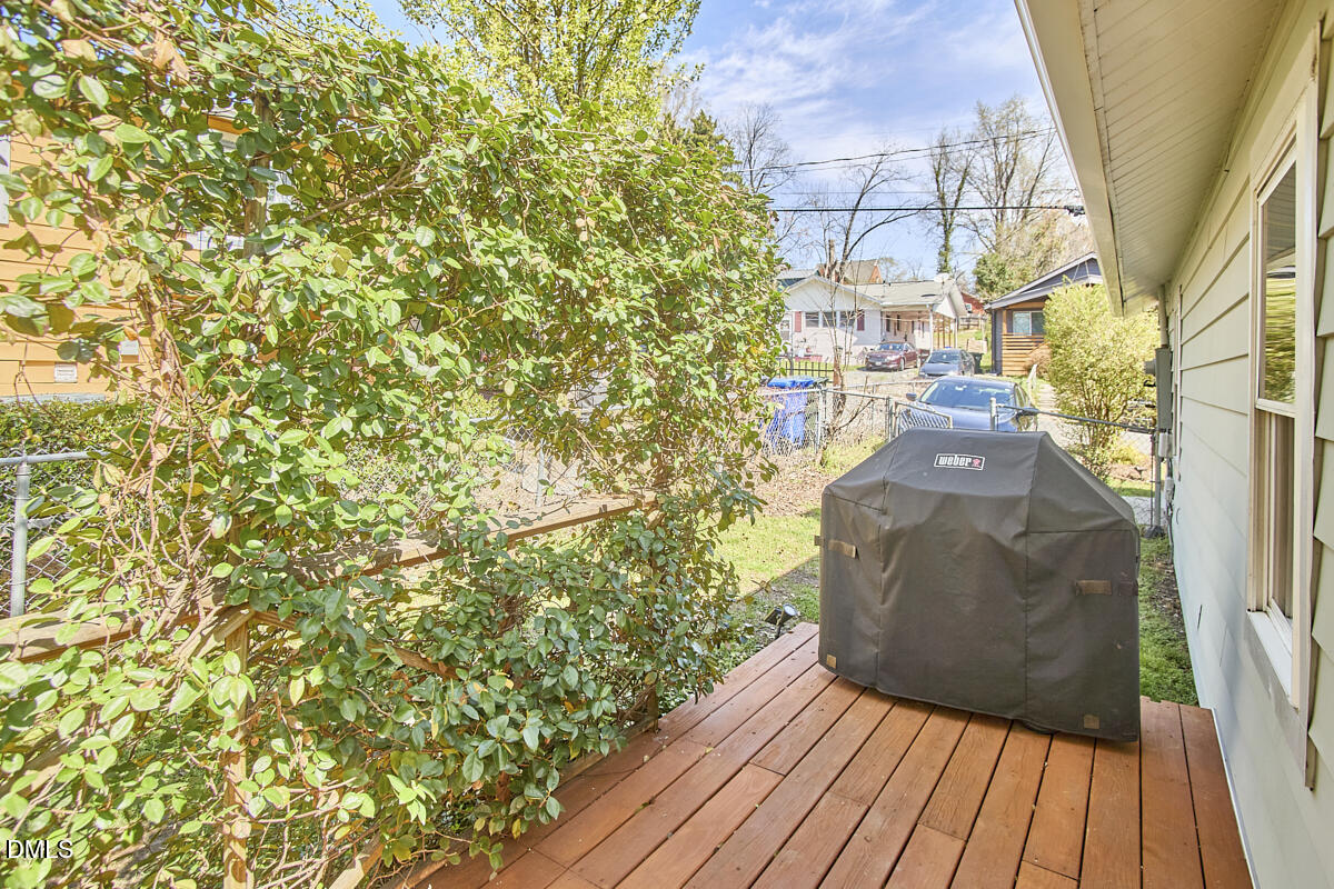 214 Moline Street Durham, NC 27707 - Photo 39 of 49 a view of a balcony with wooden floor