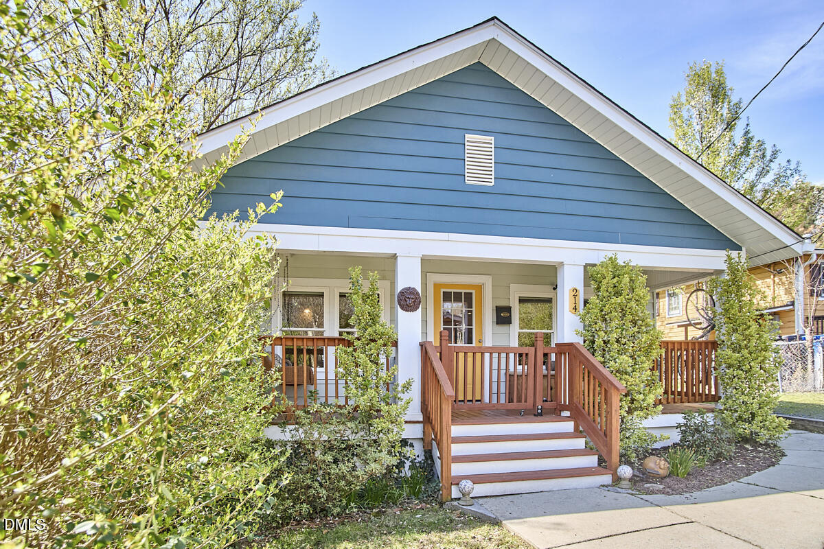 214 Moline Street Durham, NC 27707 - Photo 3 of 49 a front view of a house with a porch