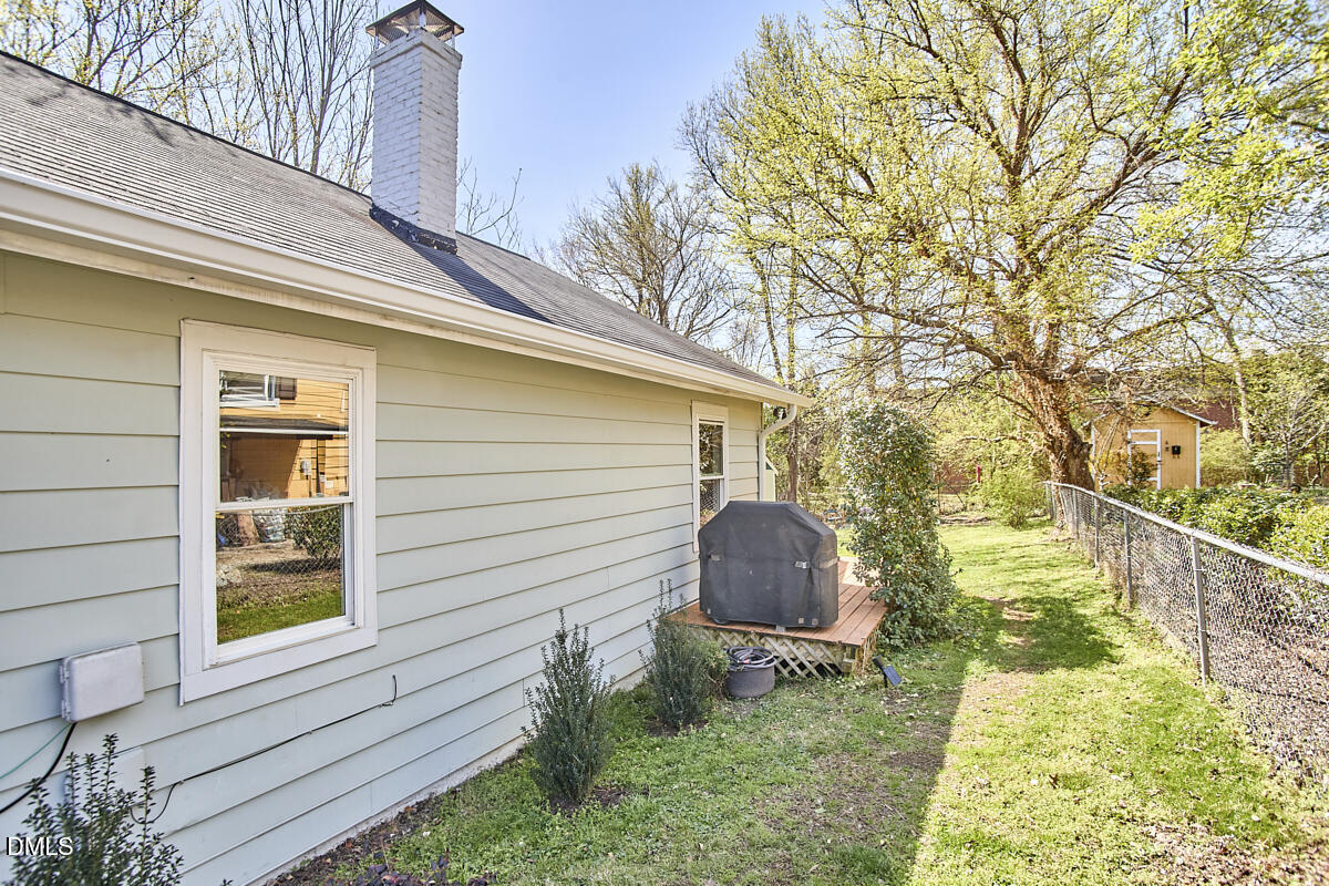 214 Moline Street Durham, NC 27707 - Photo 41 of 49 a backyard of a house with seating space