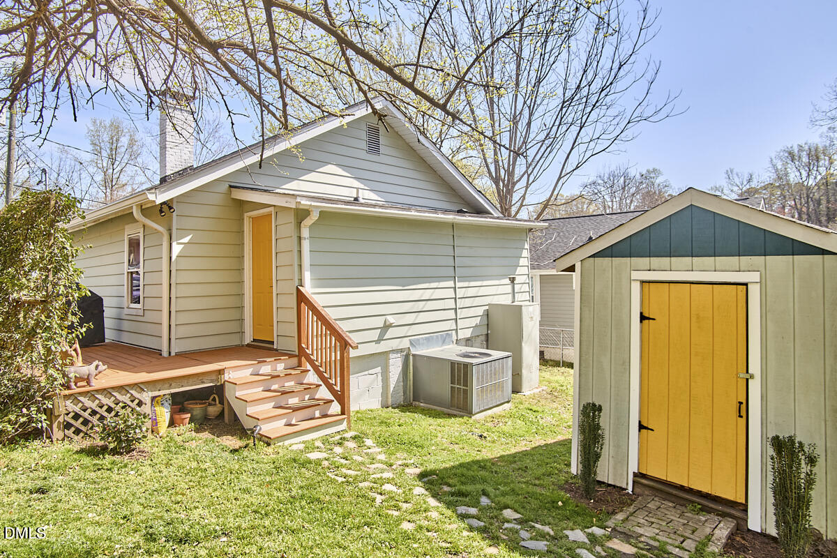 214 Moline Street Durham, NC 27707 - Photo 43 of 49 a view of a house with a yard