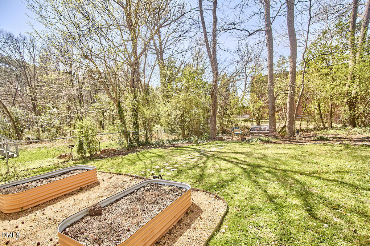 214 Moline Street Durham, NC 27707 - Photo 44 of 49 a view of swimming pool with an outdoor space and seating area
