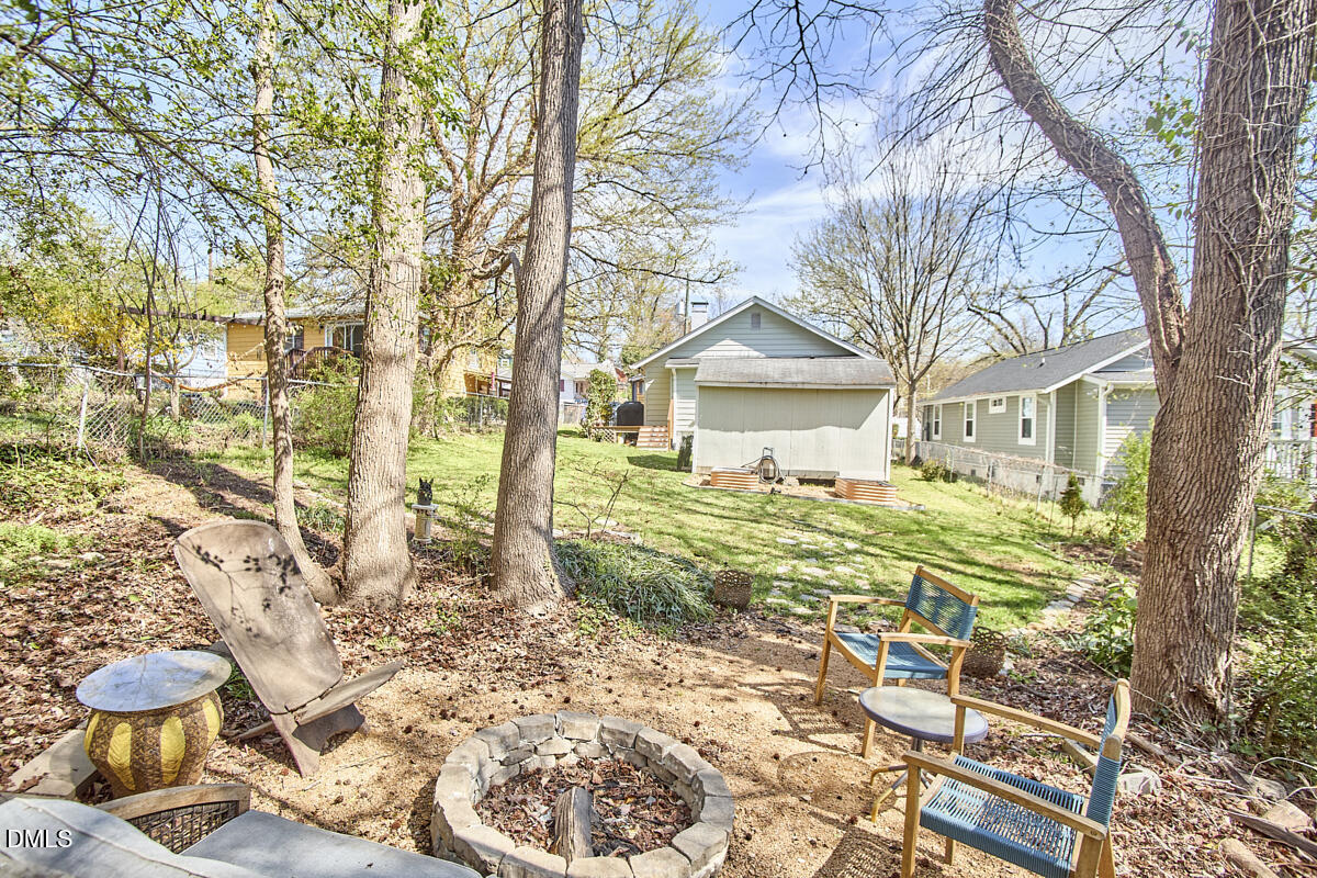 214 Moline Street Durham, NC 27707 - Photo 46 of 49 a view of a house with a yard