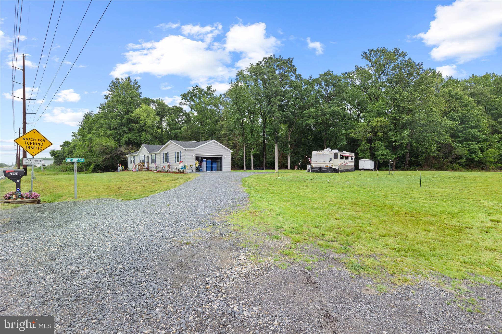 21933 Conrail Road Seaford, DE 19973 - Photo 34 of 35 a view of a house with swimming pool and sitting area