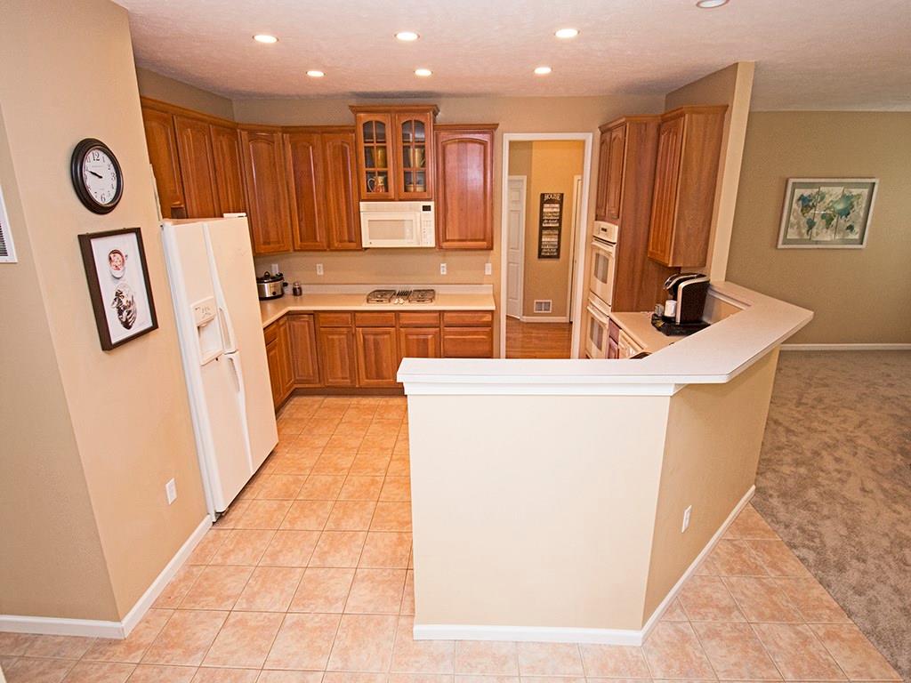 215 Cliffside Drive Mars, PA 16046 - Photo 15 of 23 a kitchen with stainless steel appliances a refrigerator and a stove