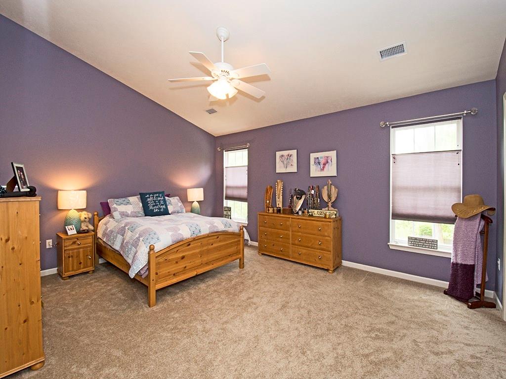 215 Cliffside Drive Mars, PA 16046 - Photo 16 of 23 a bedroom with a bed and a chandelier