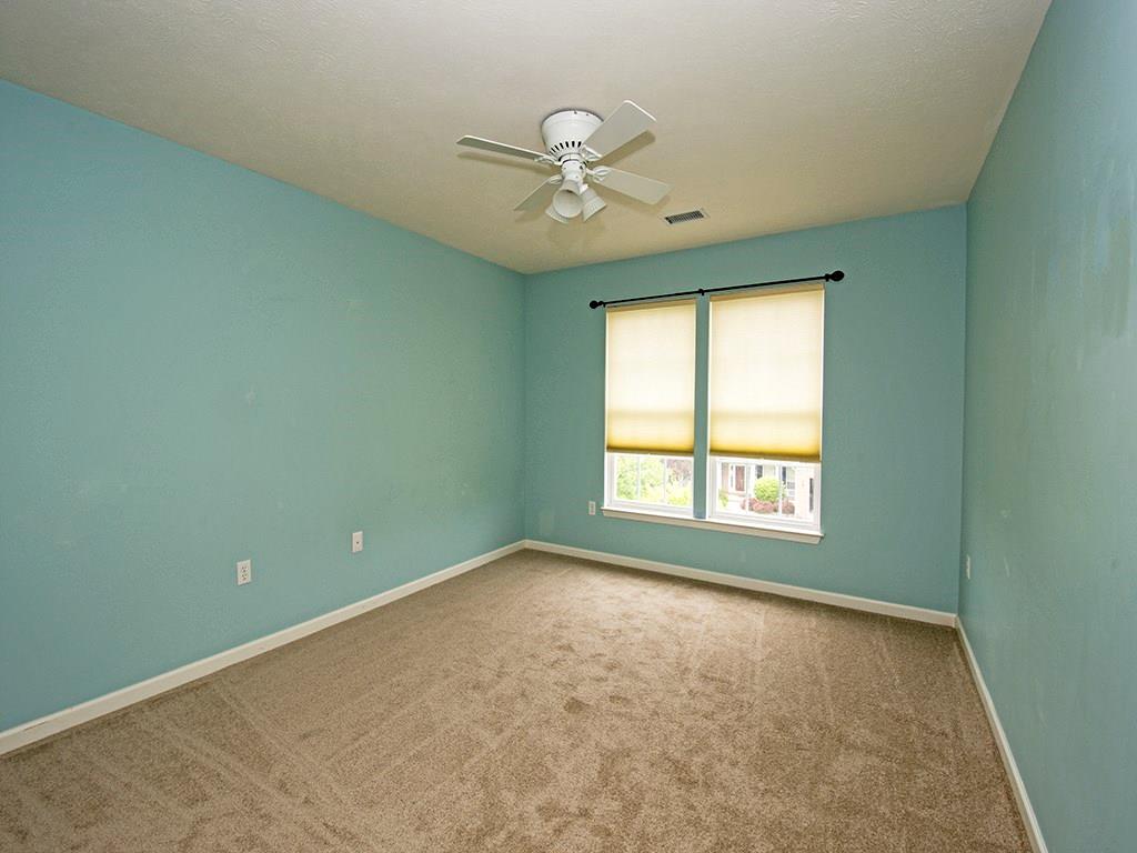 215 Cliffside Drive Mars, PA 16046 - Photo 19 of 23 an empty room with a window and a fan
