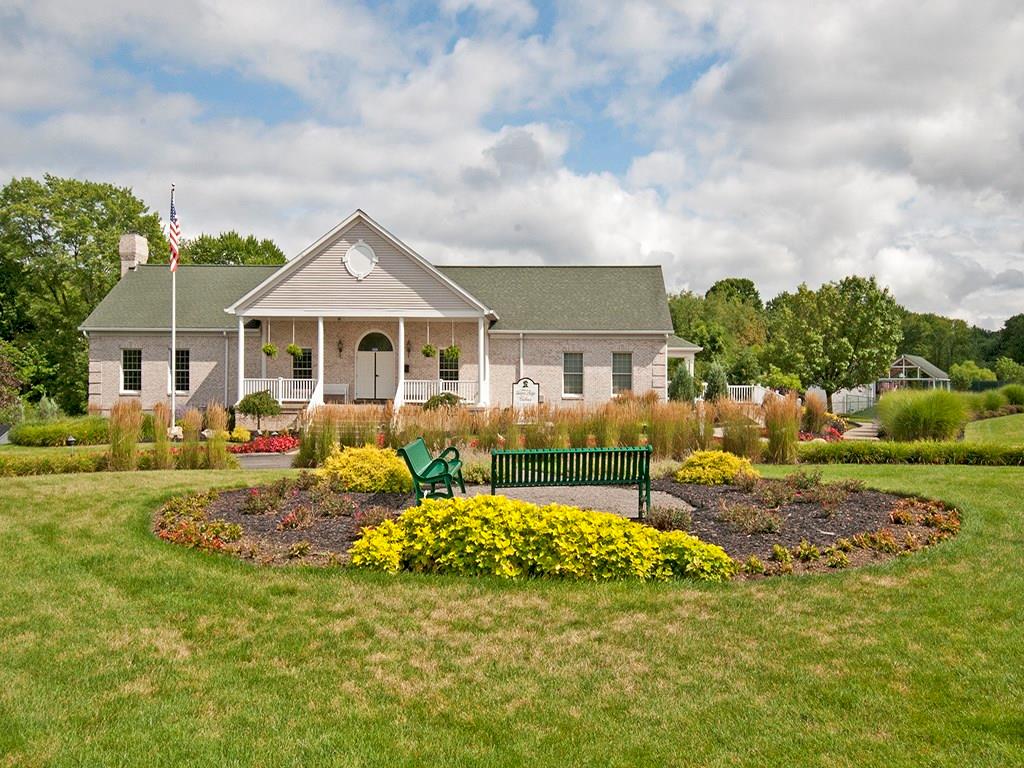215 Cliffside Drive Mars, PA 16046 - Photo 21 of 23 a front view of a house with a yard table and chairs
