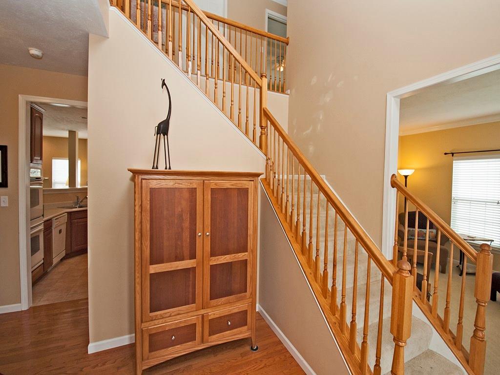 215 Cliffside Drive Mars, PA 16046 - Photo 5 of 23 a view of staircase with wooden floor and a window