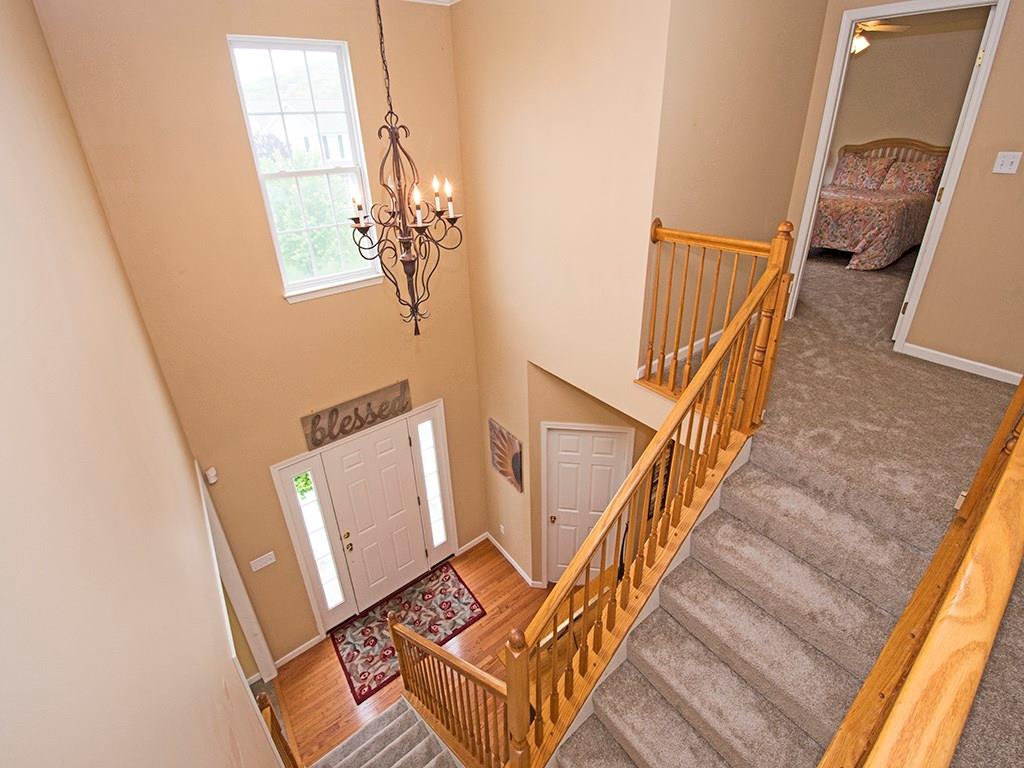 215 Cliffside Drive Mars, PA 16046 - Photo 6 of 23 a view of stairs and hall with wooden floor