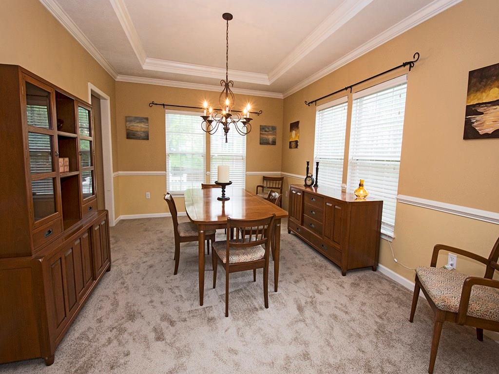 215 Cliffside Drive Mars, PA 16046 - Photo 7 of 23 a dining room with furniture a chandelier and window
