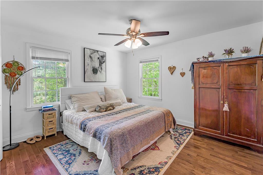 2383 Sperin Road Ball Ground, GA 30107 - Photo 12 of 38 a bedroom with a bed and a window