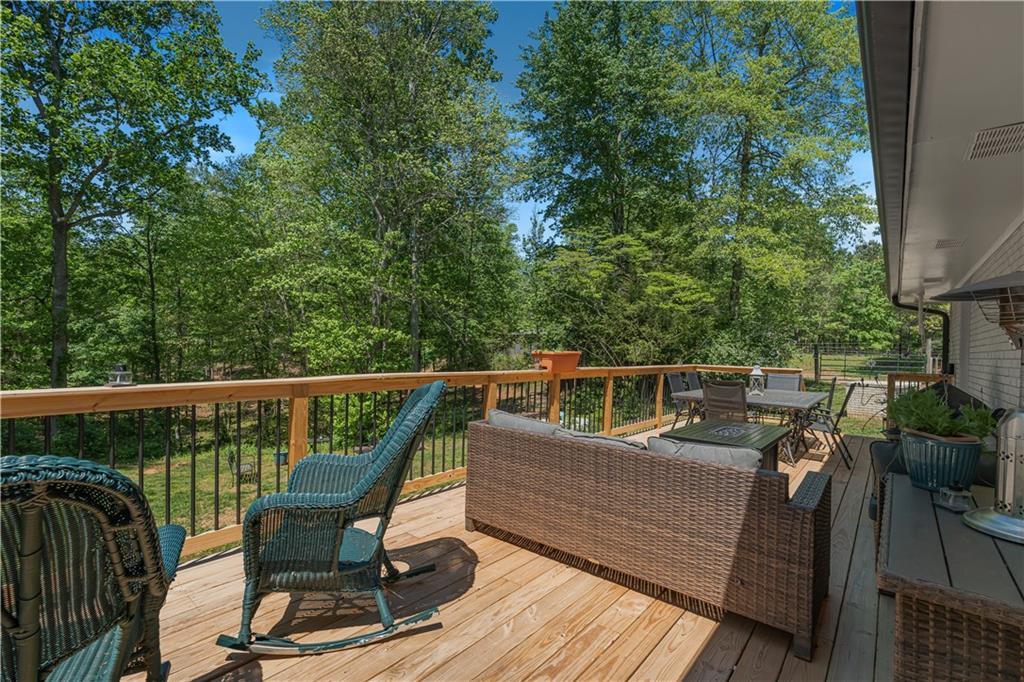 2383 Sperin Road Ball Ground, GA 30107 - Photo 17 of 38 a view of a chairs on the roof deck