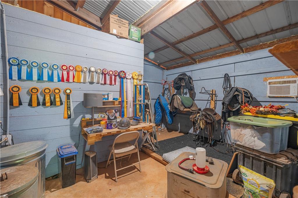 2383 Sperin Road Ball Ground, GA 30107 - Photo 19 of 38 a view of a storage room with washer and dryer