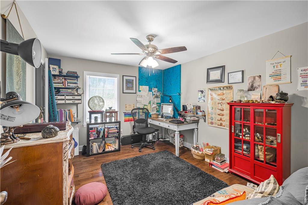 2383 Sperin Road Ball Ground, GA 30107 - Photo 21 of 38 a living room with furniture a rug and a window