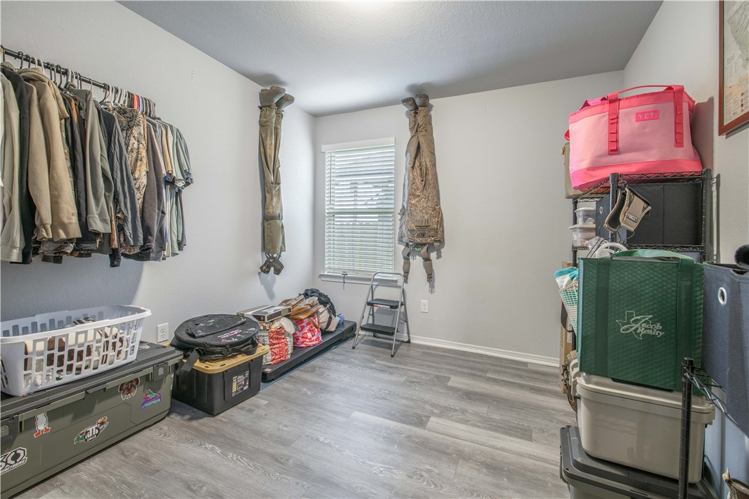 2850 Messenger Way Bryan, TX 77803 - Photo 13 of 17 a bedroom with a bed and a tv