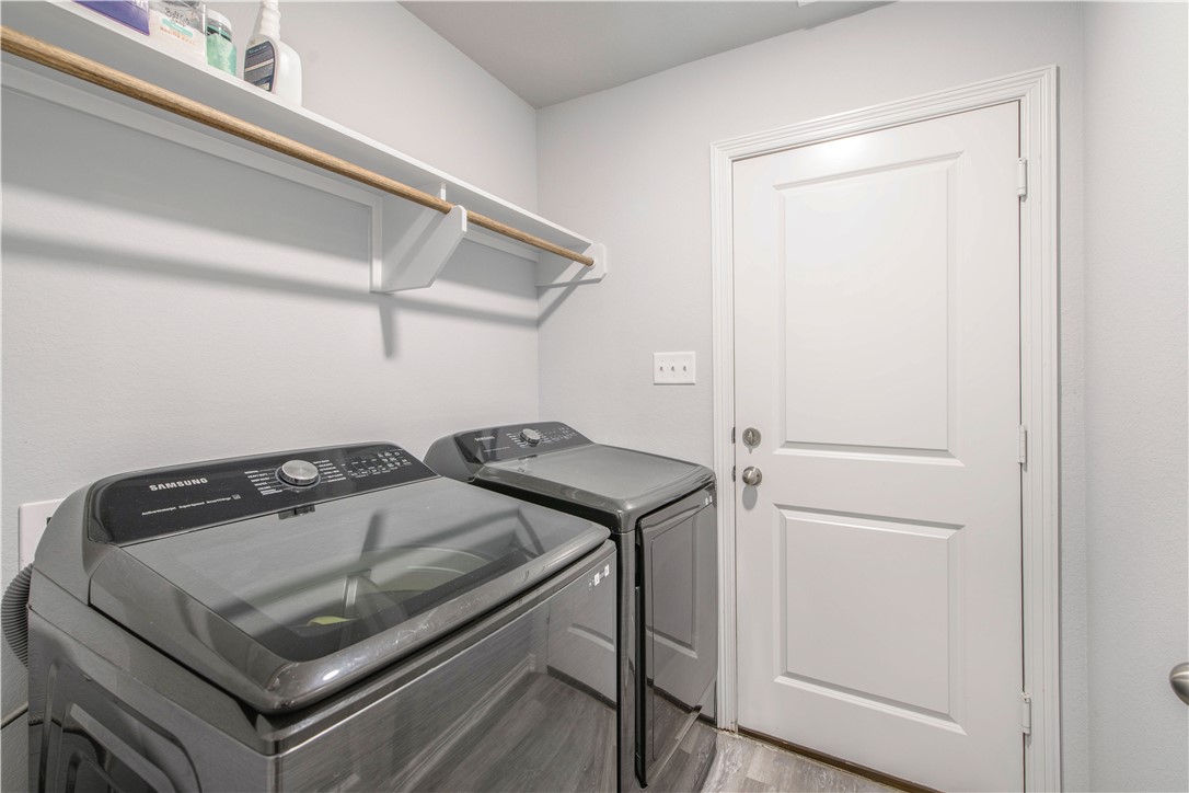 2850 Messenger Way Bryan, TX 77803 - Photo 15 of 17 a utility room with dryer and washer