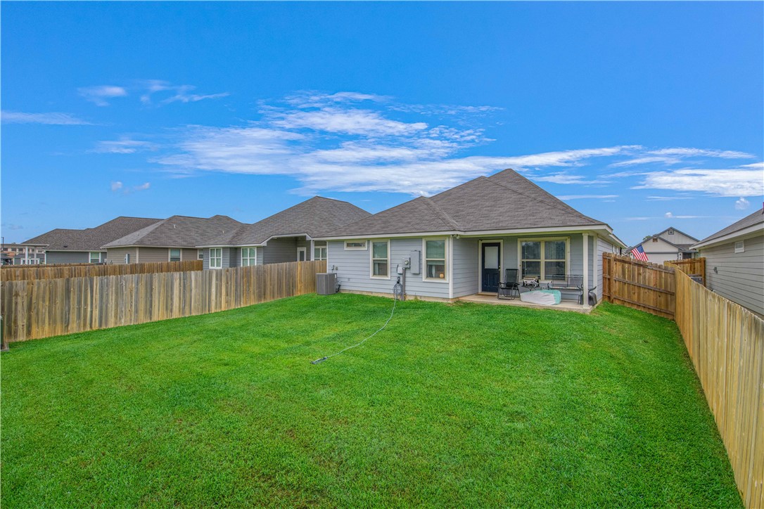 2850 Messenger Way Bryan, TX 77803 - Photo 16 of 17 a front view of a house with yard and lake view