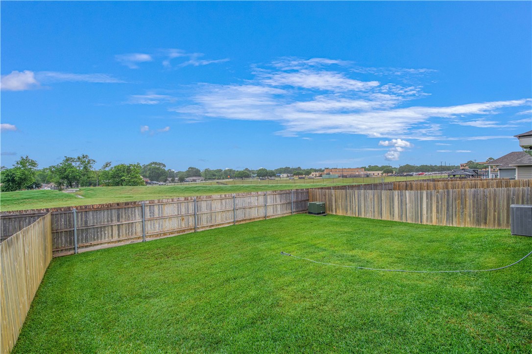 2850 Messenger Way Bryan, TX 77803 - Photo 17 of 17 a view of a yard with a lake view