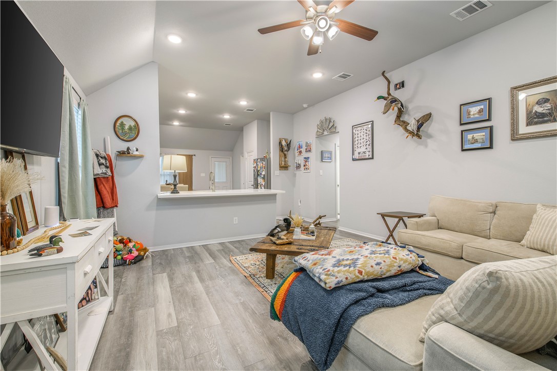 2850 Messenger Way Bryan, TX 77803 - Photo 4 of 17 a living room with furniture and a flat screen tv