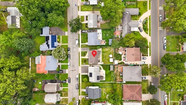 an aerial view of residential house with outdoor space and city view