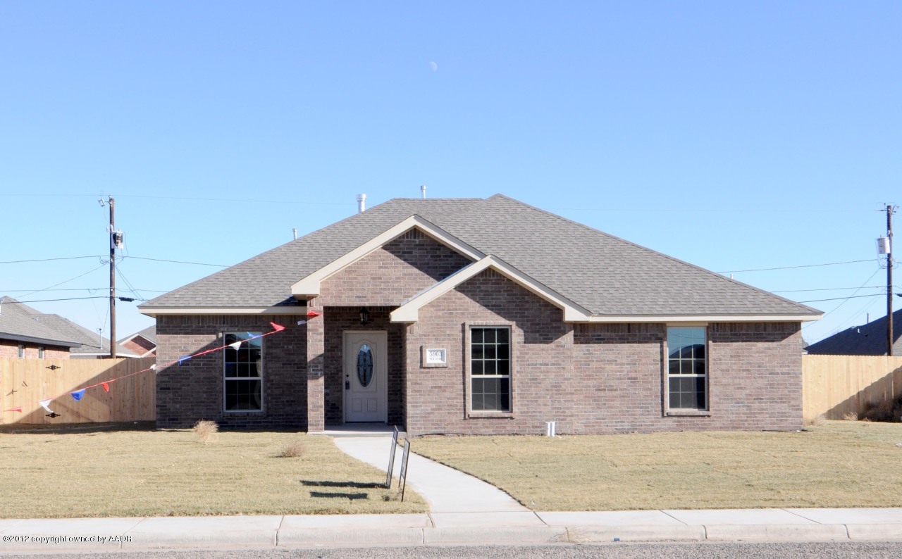 5903 South Rusk Street Amarillo, TX 79118 - Photo 1 of 16 a front view of a house with a garage