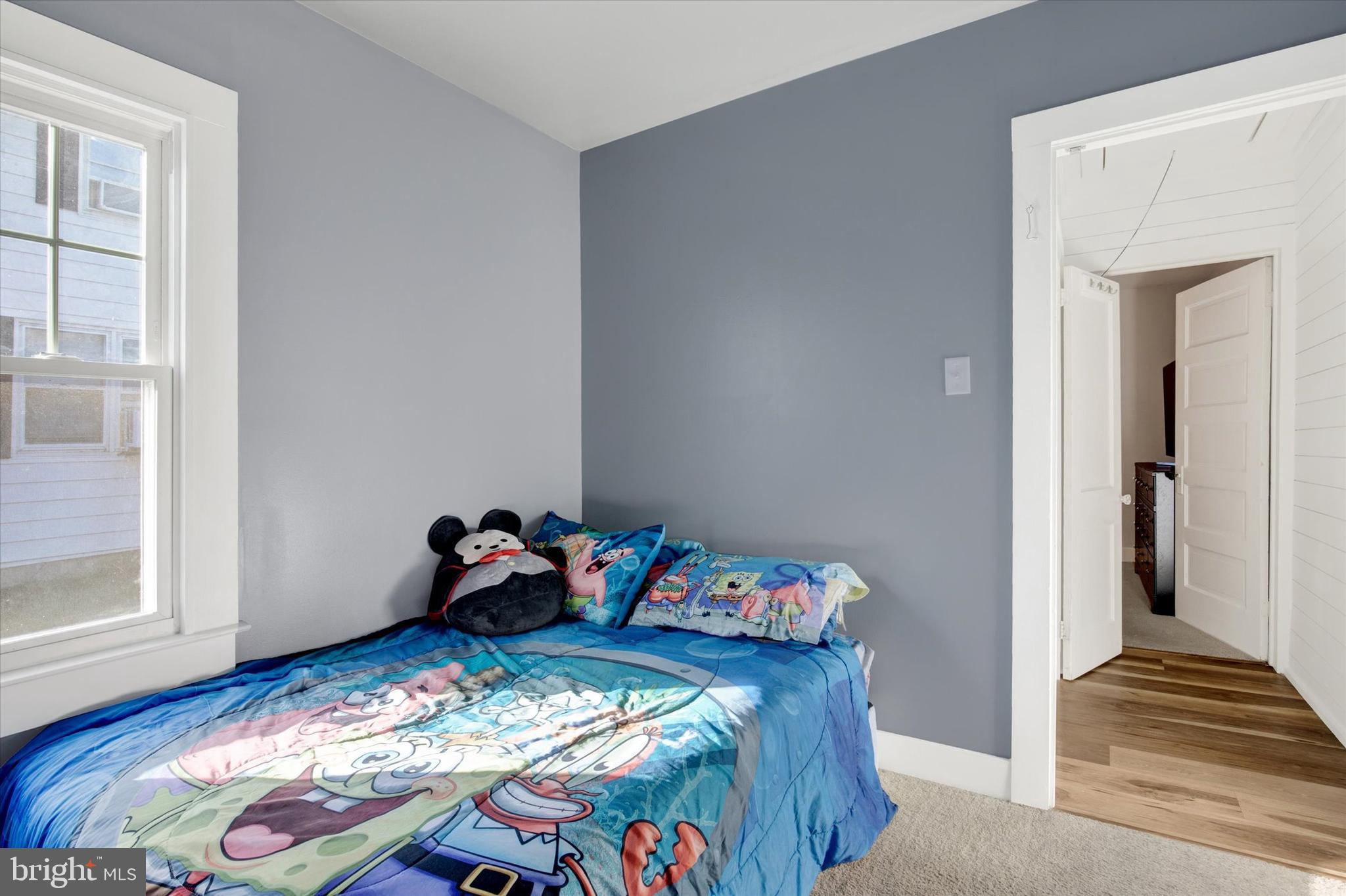 603 Ferry Street Sharptown, MD 21861 - Photo 22 of 28 a bedroom with baby bed and a window