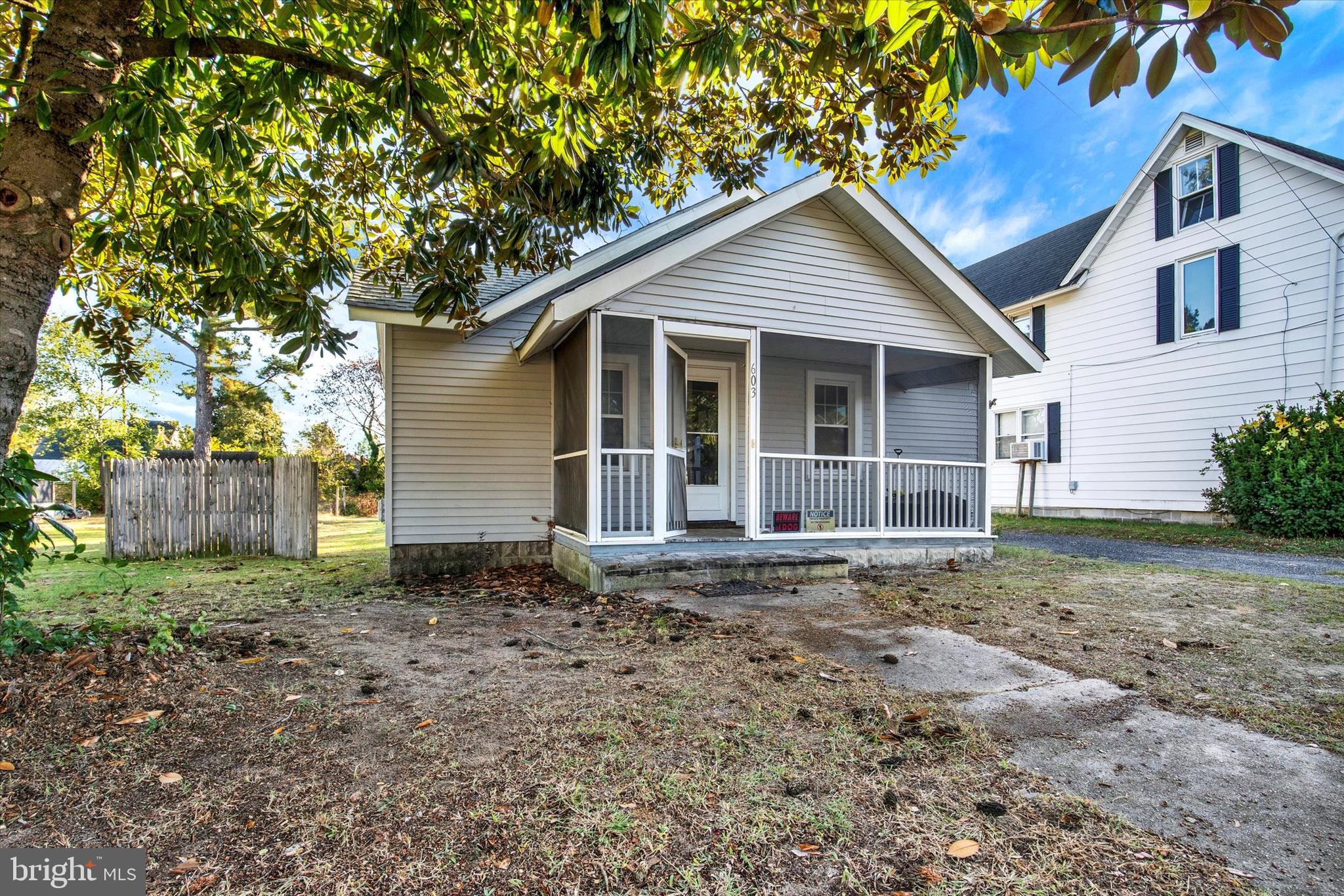603 Ferry Street Sharptown, MD 21861 - Photo 3 of 28 a view of a house with a yard
