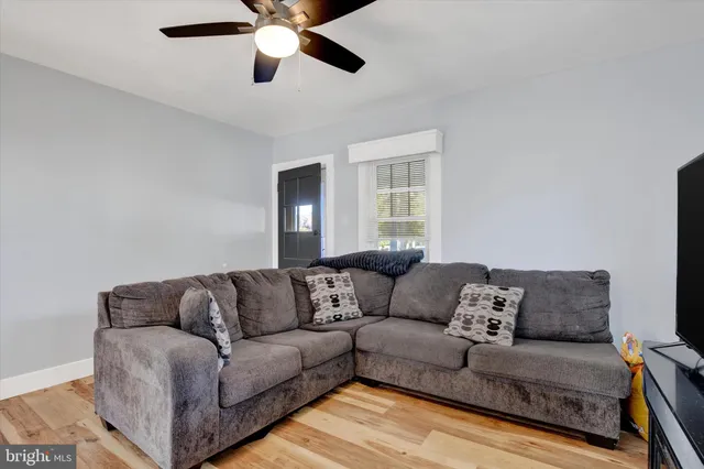 a living room with furniture and a couch