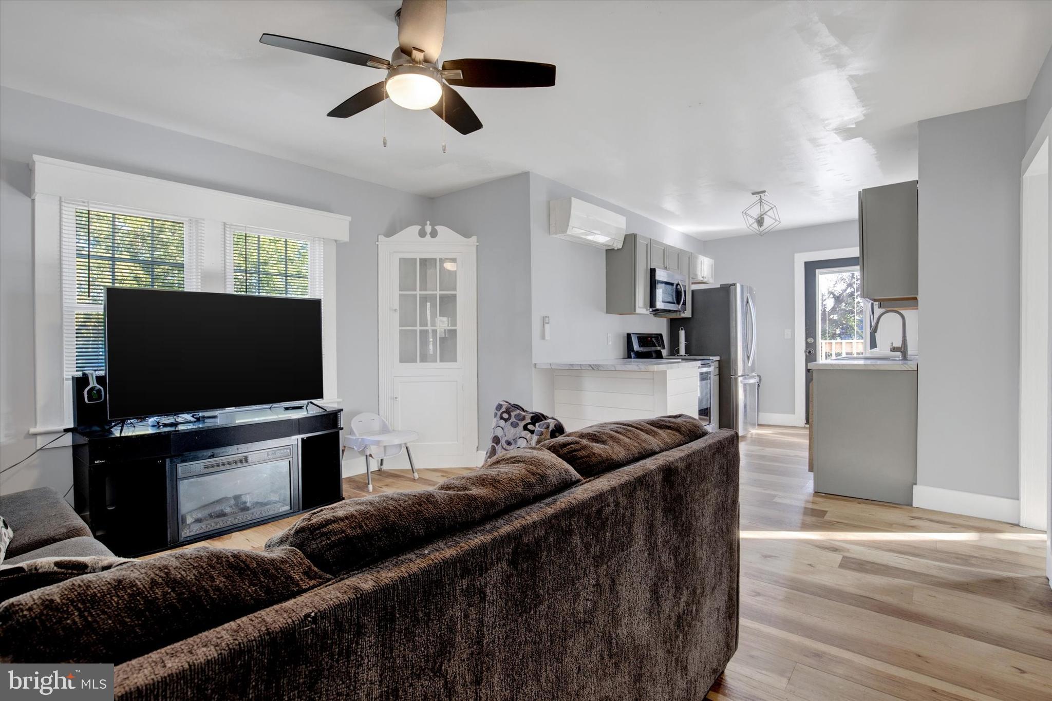 603 Ferry Street Sharptown, MD 21861 - Photo 9 of 28 a bedroom with furniture and a flat screen tv