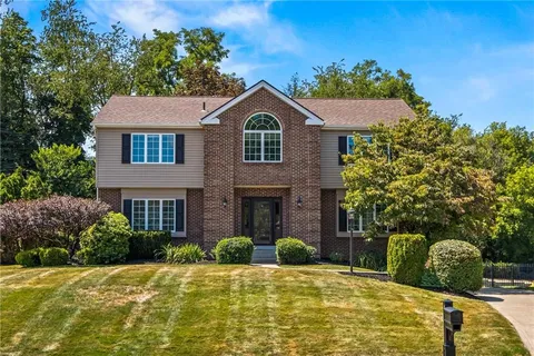 a house view with a garden space