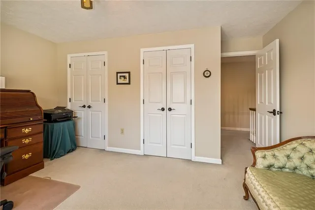 a view of livingroom with furniture and cabinet