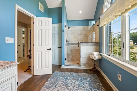 a room with a couch and a rug