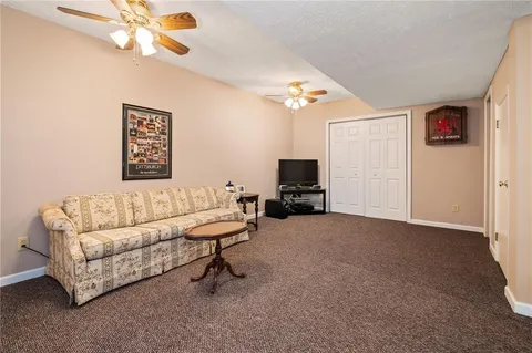 a living room with furniture and a table