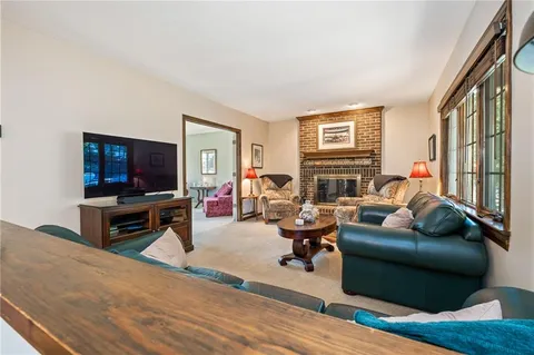 a view of a patio with a table chairs and a patio