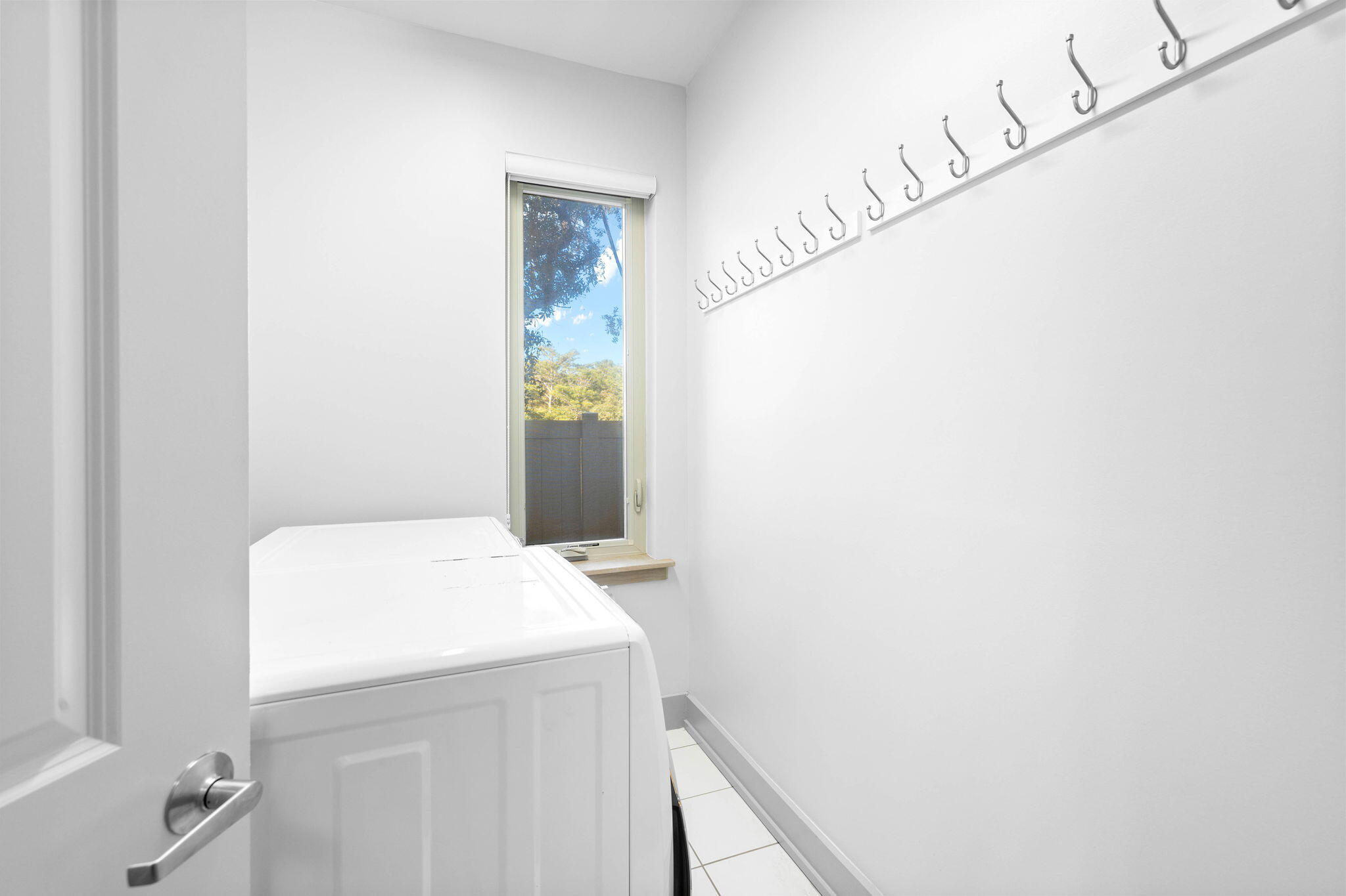 18 Sand Cliffs Drive Inlet Beach, FL 32461 - Photo 23 of 56 a utility room with dryer and washer