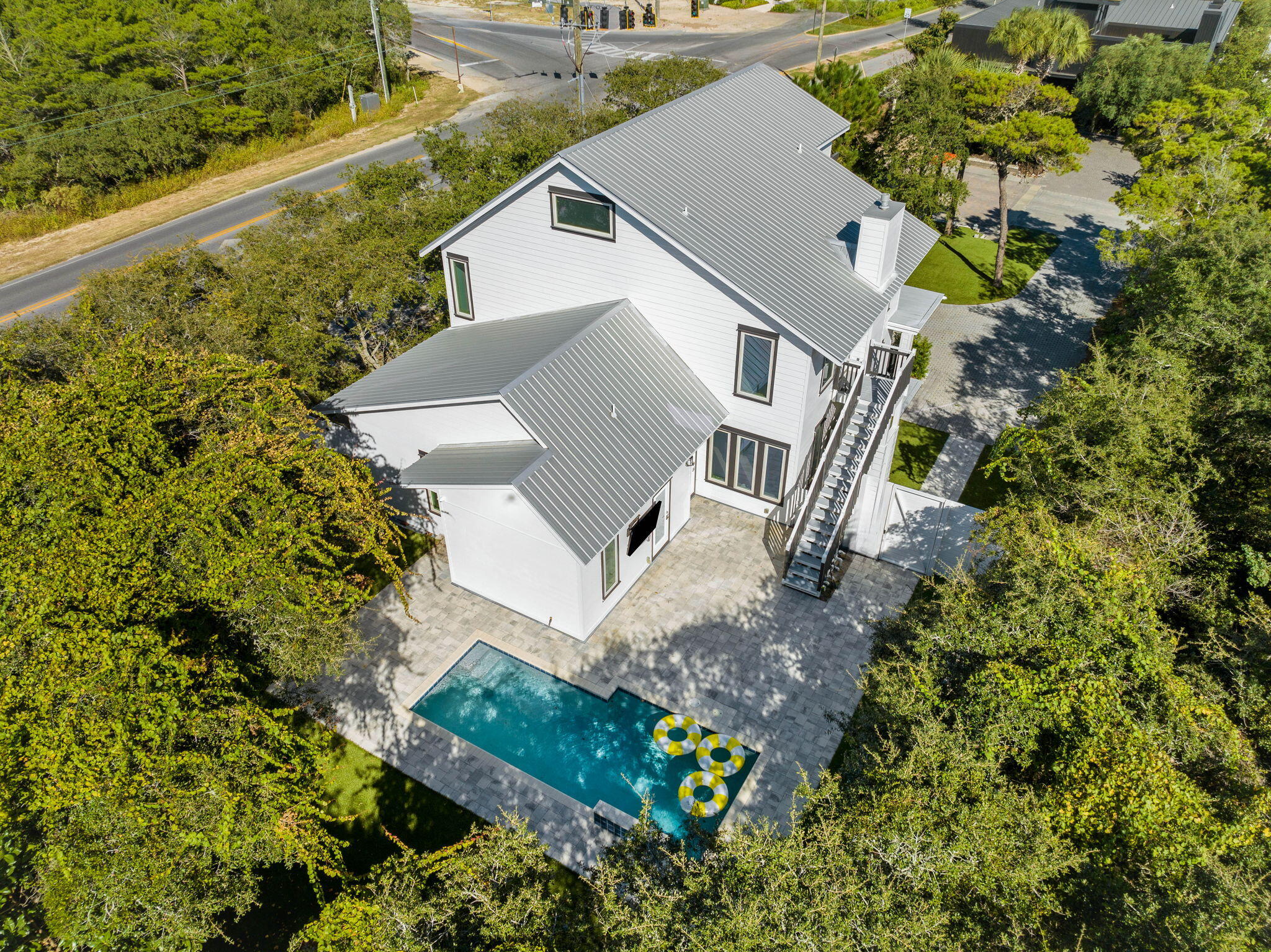 18 Sand Cliffs Drive Inlet Beach, FL 32461 - Photo 3 of 56 an aerial view of a house with a yard