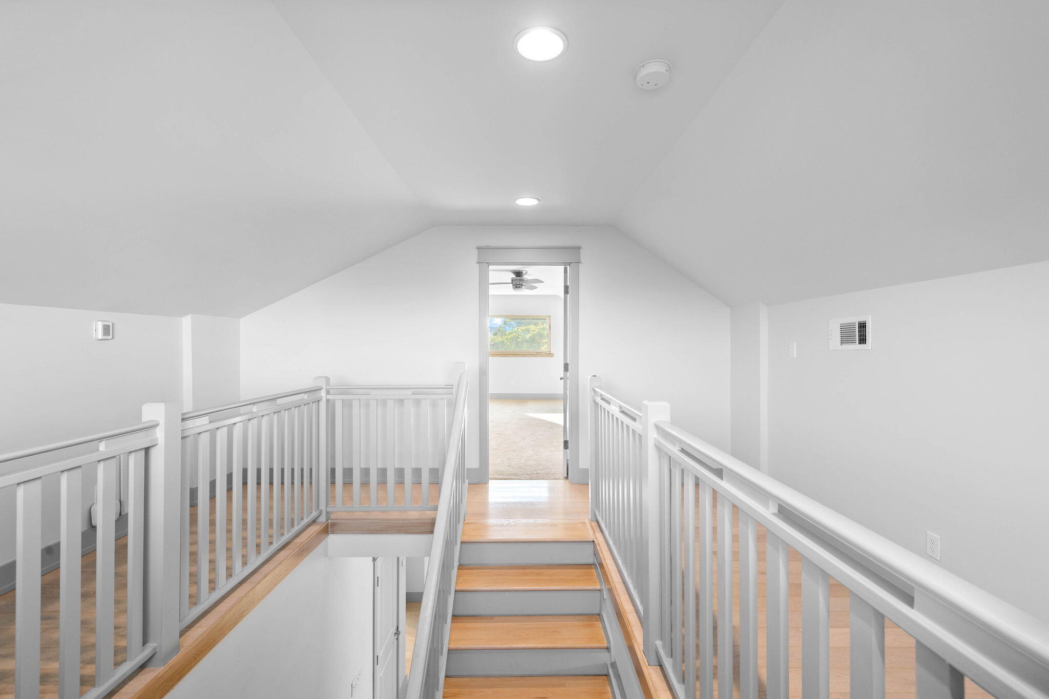 18 Sand Cliffs Drive Inlet Beach, FL 32461 - Photo 36 of 56 a view of a hallway with wooden floor and stairs