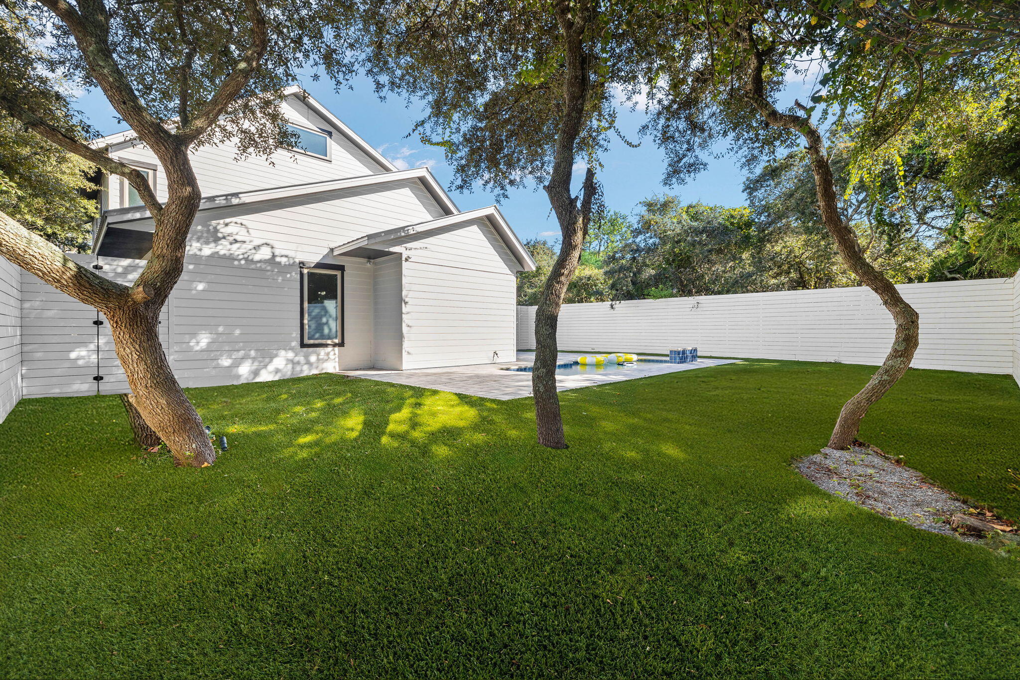 18 Sand Cliffs Drive Inlet Beach, FL 32461 - Photo 45 of 56 a view of a house with a backyard