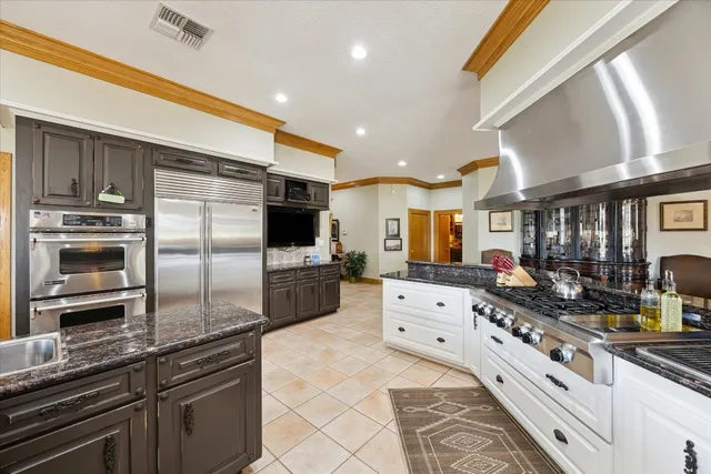 a living room with fireplace furniture and a flat screen tv
