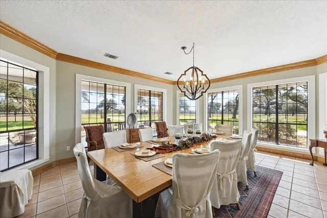 a view of a kitchen and dining room