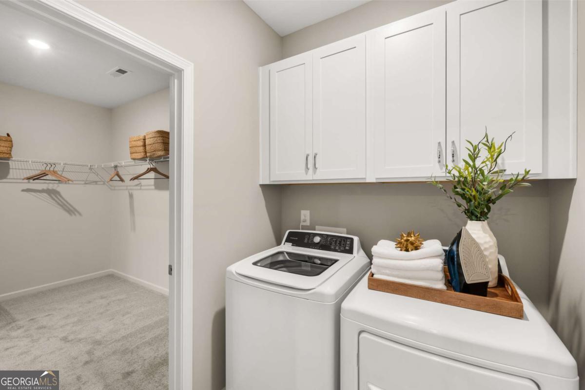 234 Shantz Way, Unit (LOT A34) Byron, GA 31008 - Photo 23 of 23 a view of storage and utility room with washer and dryer