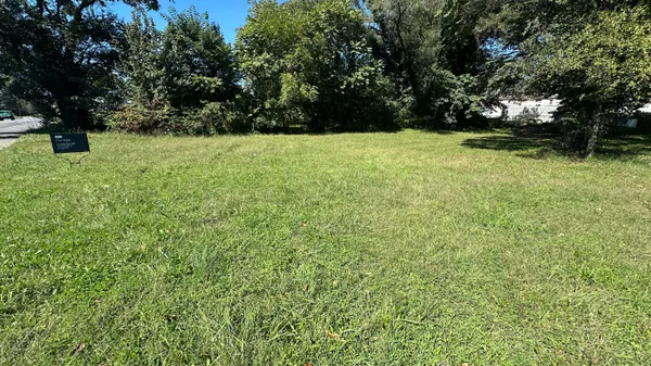 a view of an outdoor space with a lake view