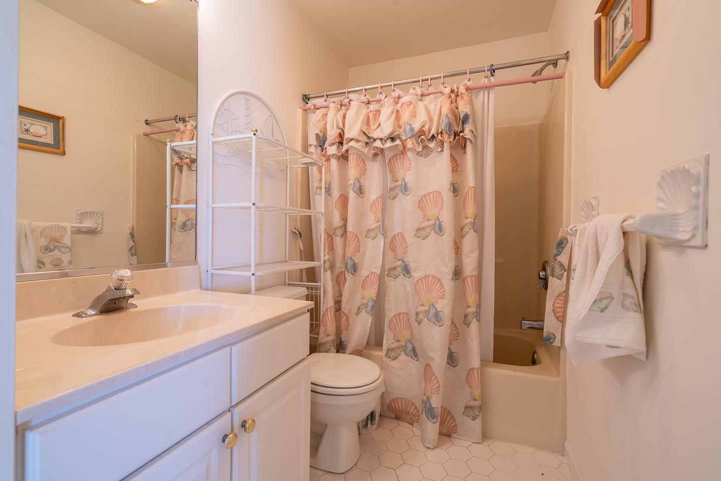 12 82nd Street, Unit NORTH Sea Isle City, NJ 08243 - Photo 14 of 26 a bathroom with a sink toilet and shower